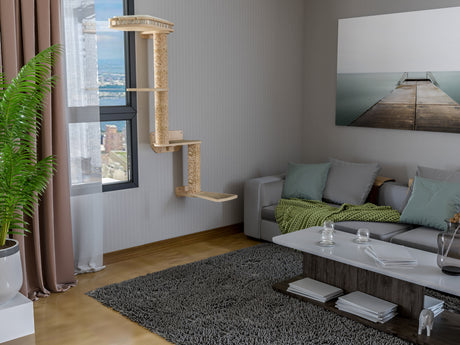 Modern living room with a gray sofa, coffee table, and cat wall tree.