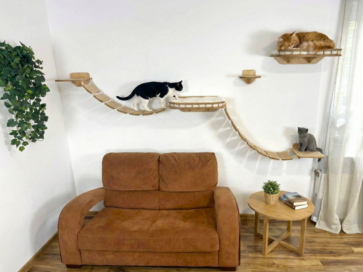 Living room with brown armchair, cat tree, and small round table.