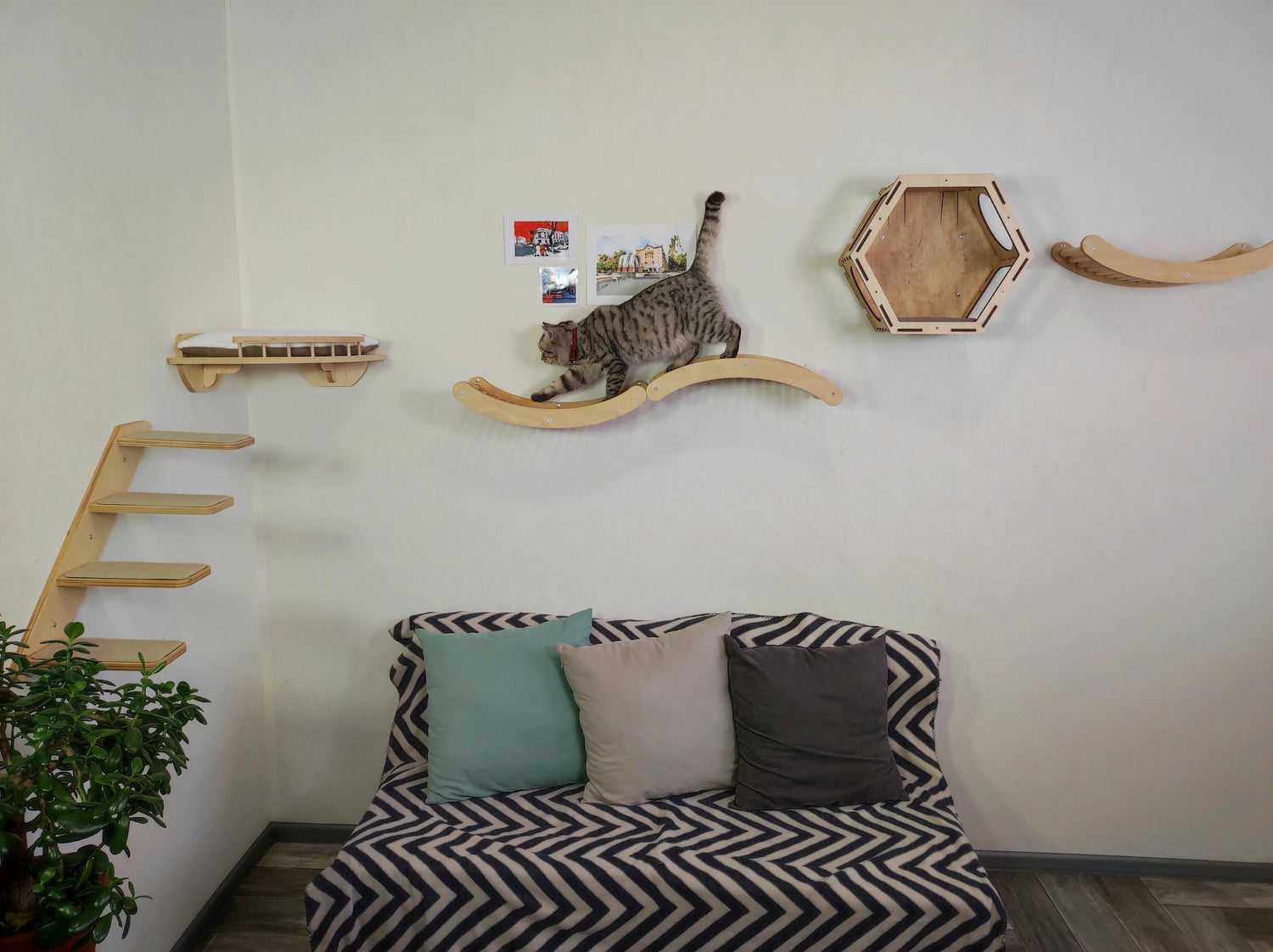 Interactive wall-mounted cat tree with multiple levels