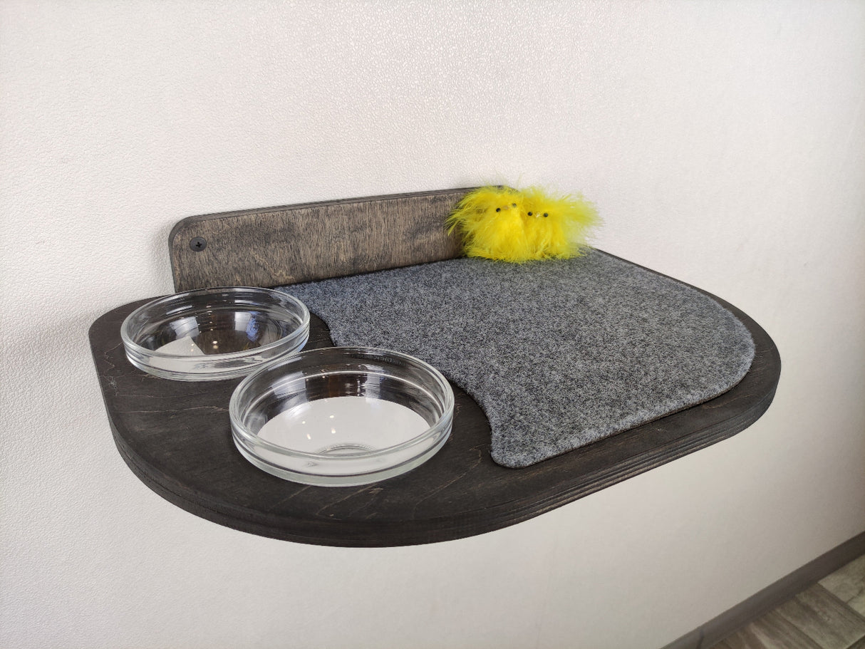 Dark wood cat shelf for food and rest, featuring dual glass bowls