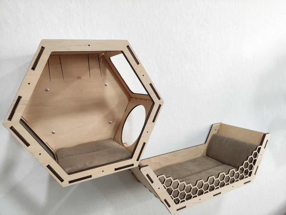 Set of hexagonal wall mounted cat perches in light wood color. 3 shelves and 3 steps for cat comfort.