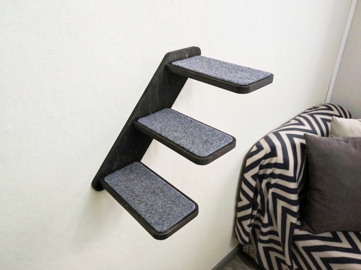 Carpeted wall ladder for cats, designed to match other modular cat furniture.