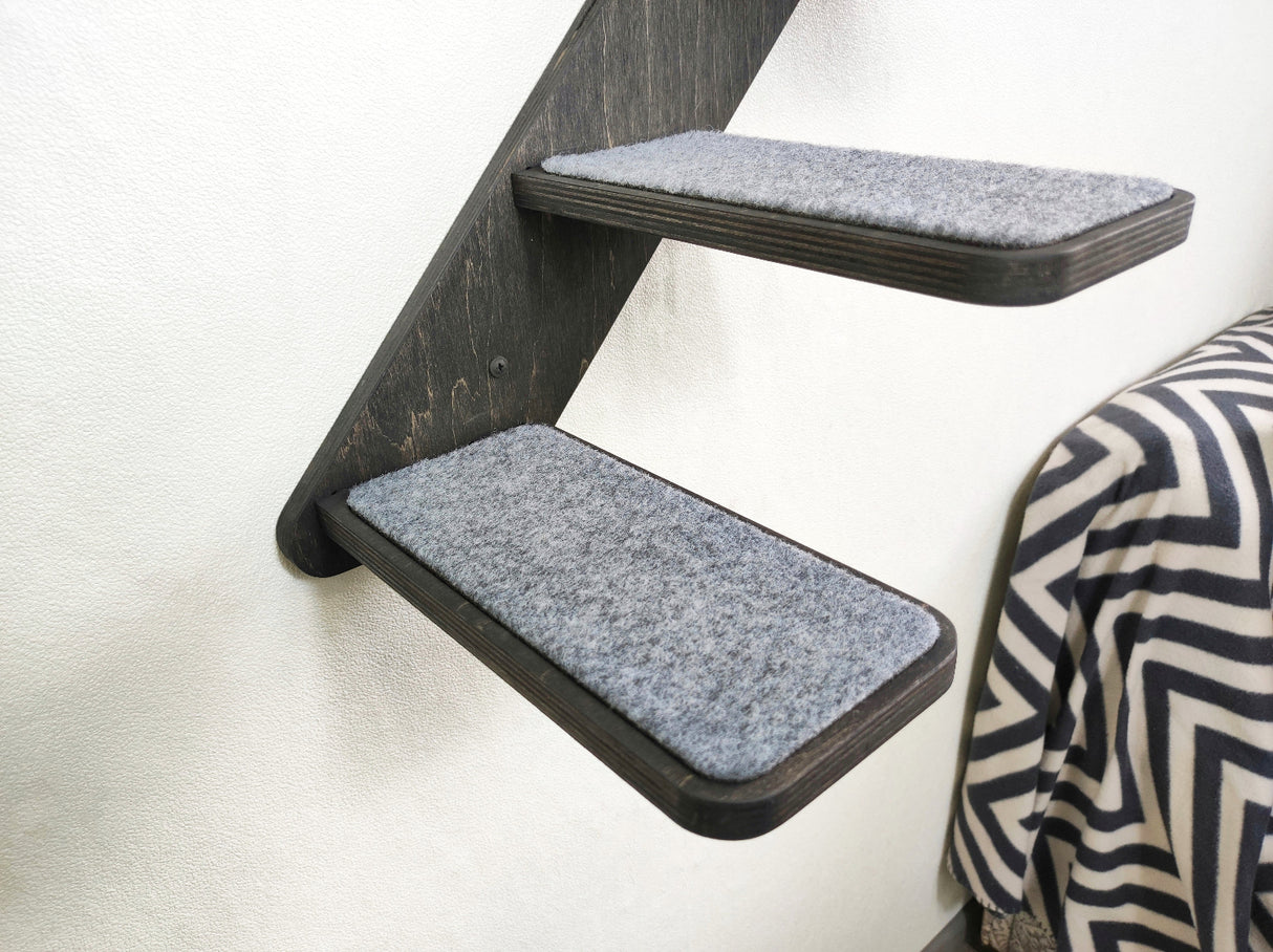 Stylish and space-saving wooden cat ladder, perfect for small apartments and modern interiors.