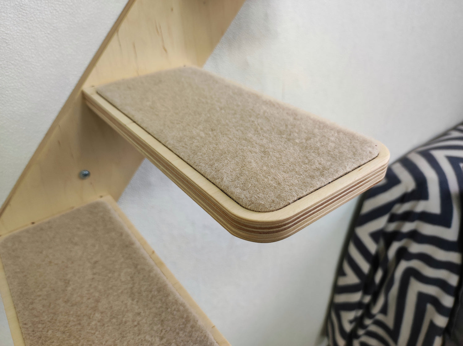 Durable cat wall ladder with 4 non-slip steps, supports up to 33 lb, easy to install on any wall.