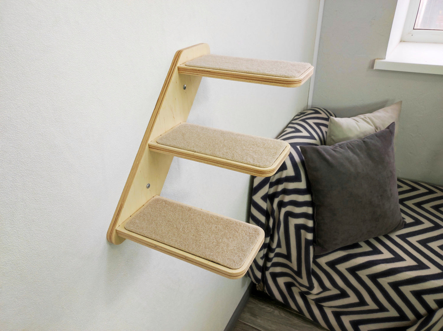 Functional cat climbing ladder with soft carpeted steps, promotes exercise and enrichment.
