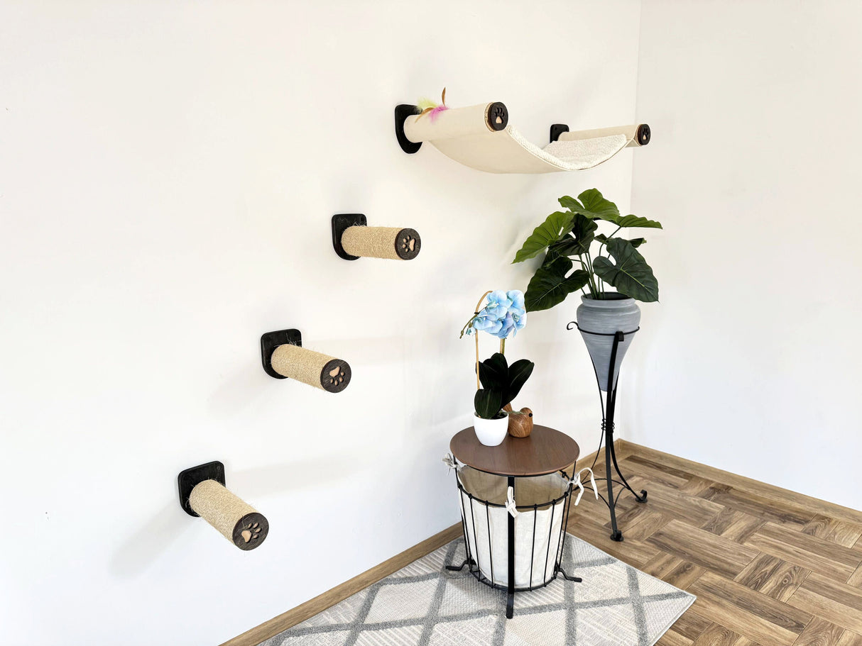 Cat climbing wall with multiple levels in a room with a plant and decorative items.