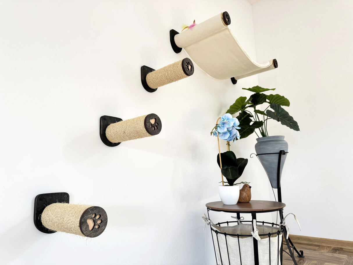 Wall-mounted cat climbing structure with cat wall steps and a small table with plants on a light-colored floor.
