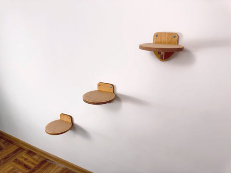 Wall-mounted cat steps: trio of round plywood platforms, eco-oil finish, secure carpet. Perfect for climbing