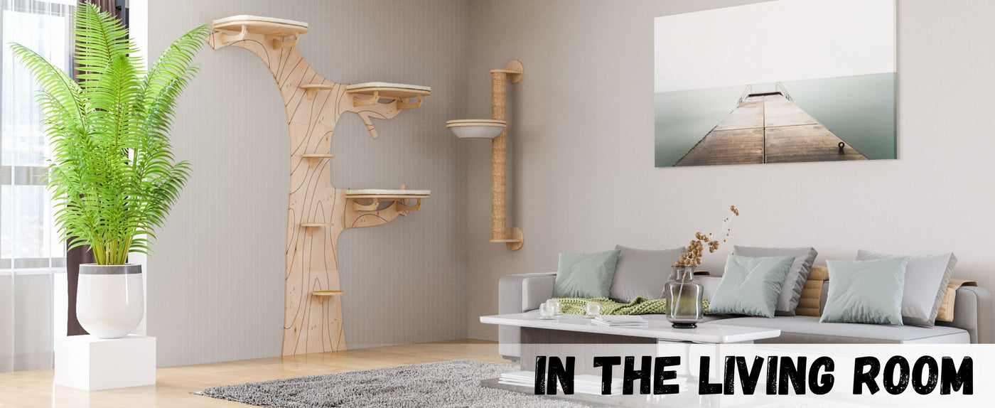 Living room with a cat tree, sofa, and decorative elements.