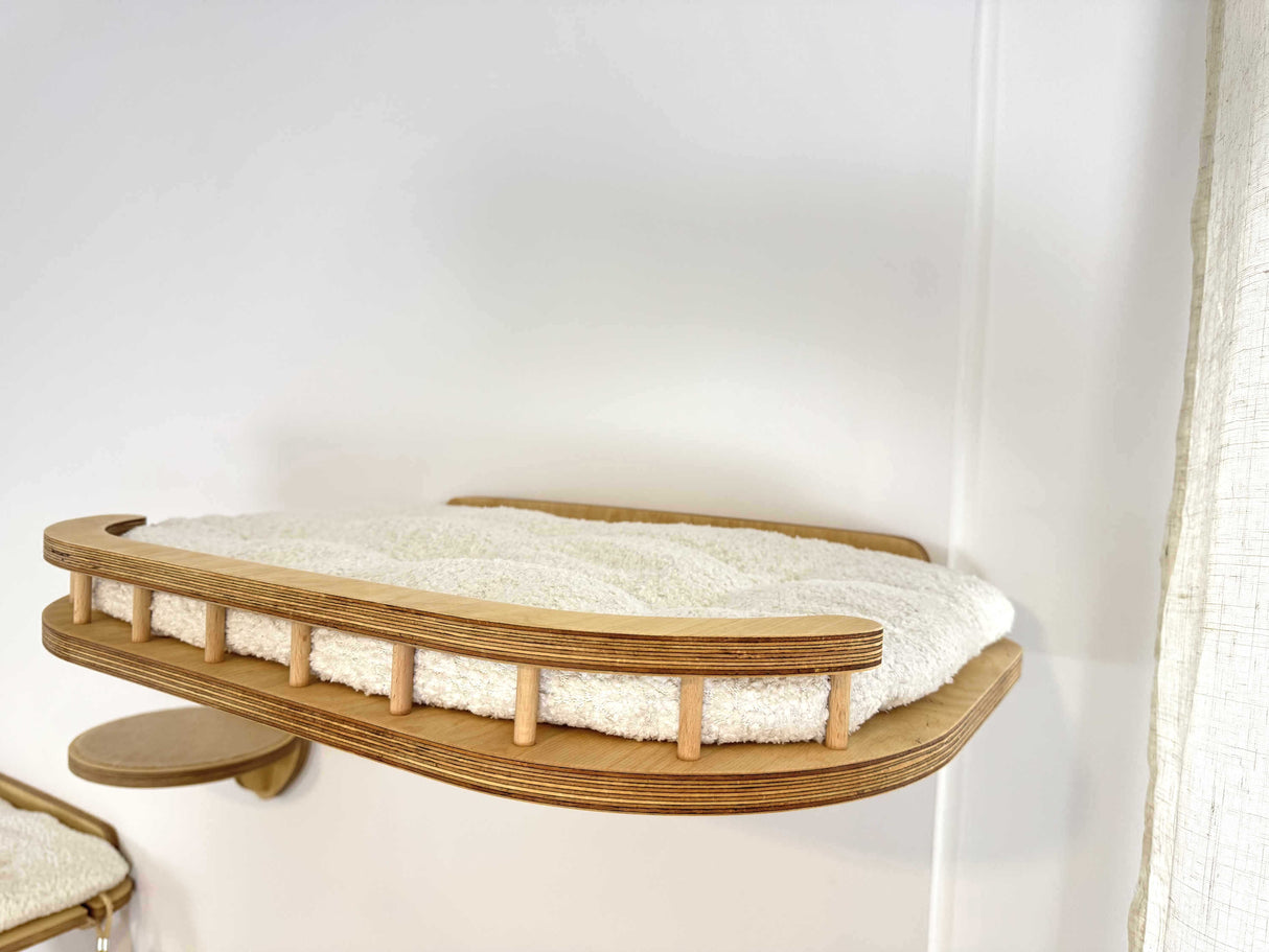 Cat wall shelf-bed with white cushion