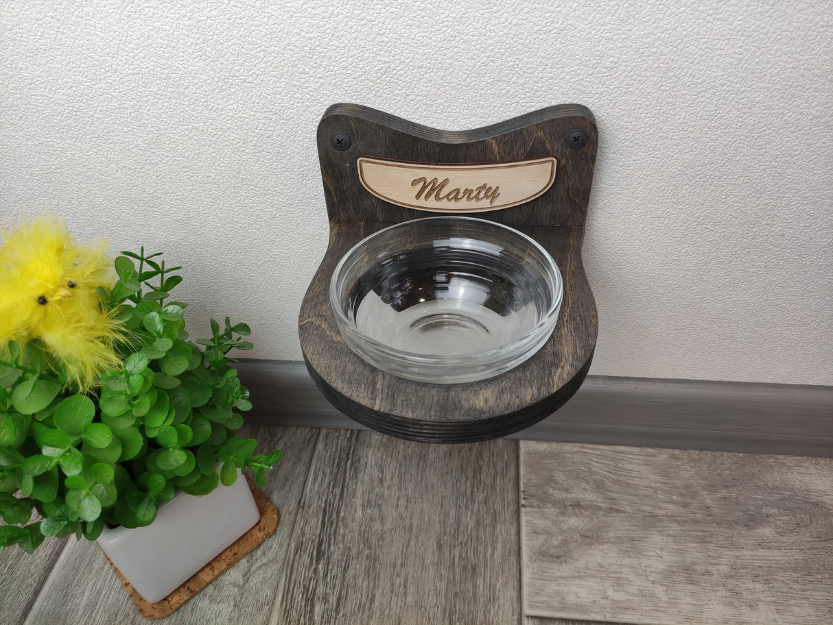 Dark wooden cat feeding shelf with one bowl, wall-mounted design