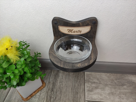 Dark wooden cat feeding shelf with one bowl, wall-mounted design