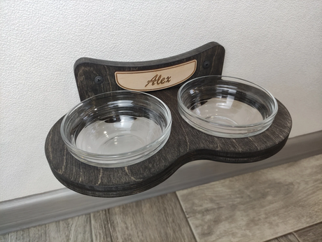 Modern wall-mounted cat shelf feeder in dark wood finish