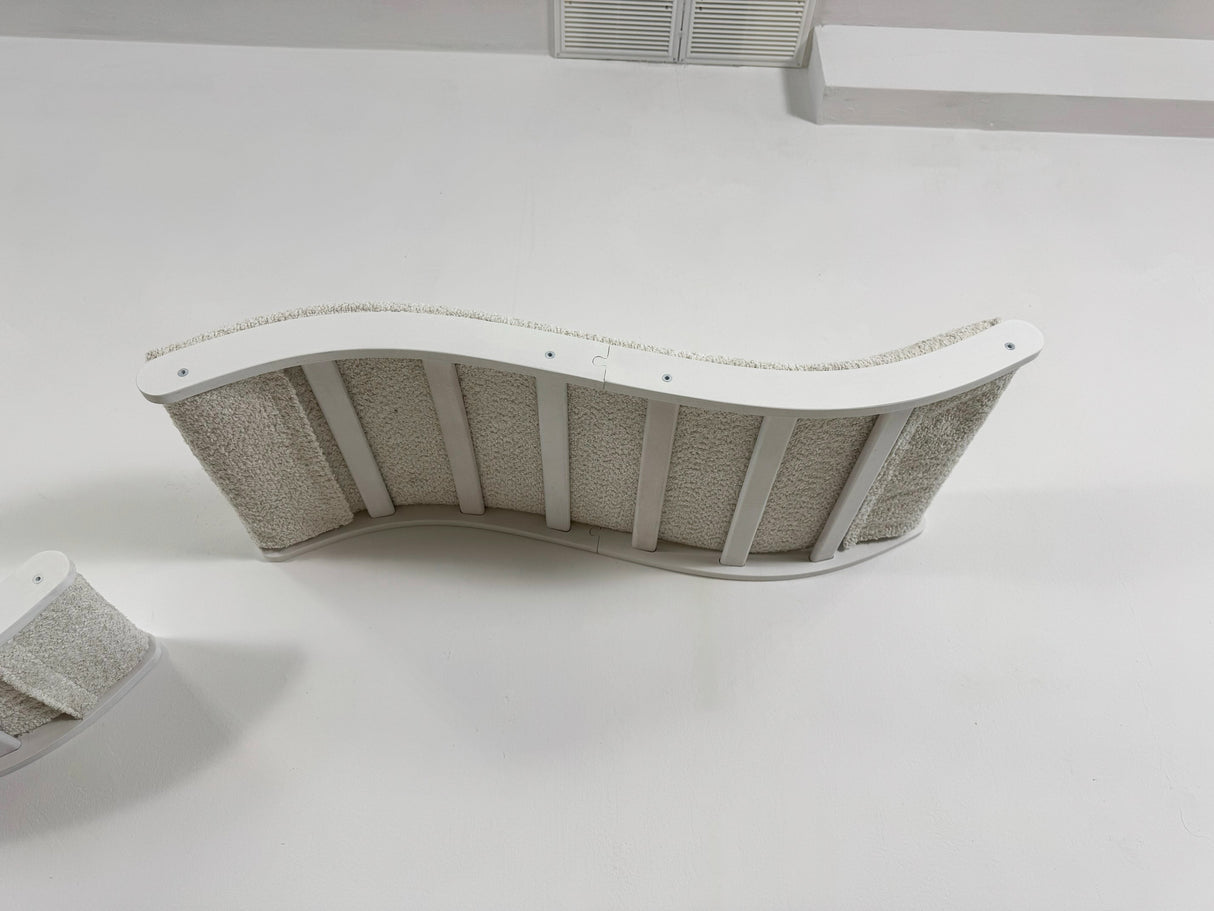 Curved wall shelf with pillow bottom view