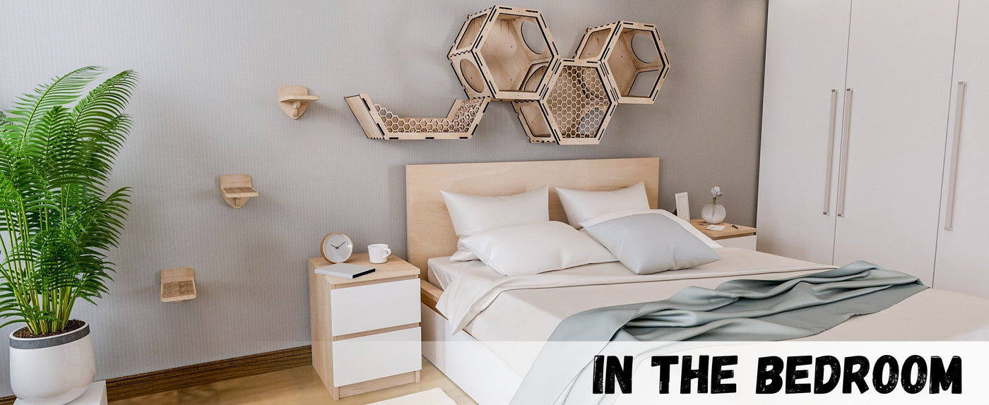 Modern bedroom with light wood furniture, decorative baskets, and cat wall bed