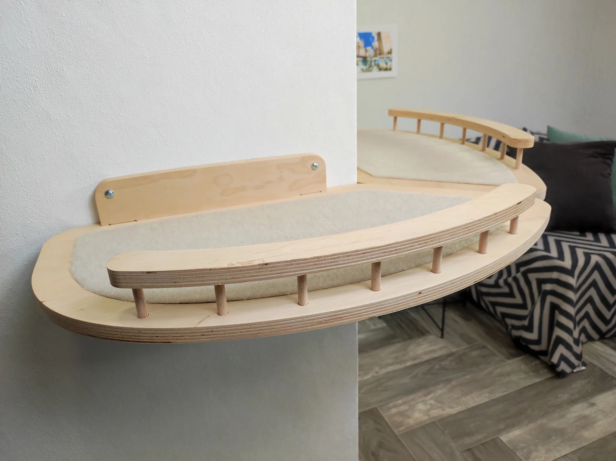 light cat shelf with brown carpet