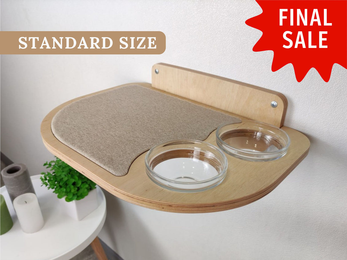 Modern wall-mounted cat shelf in light birch wood with right-side recessed bowls and soft beige mat