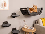 Cat lounging on a wall-mounted cat shelf in a cozy living room.