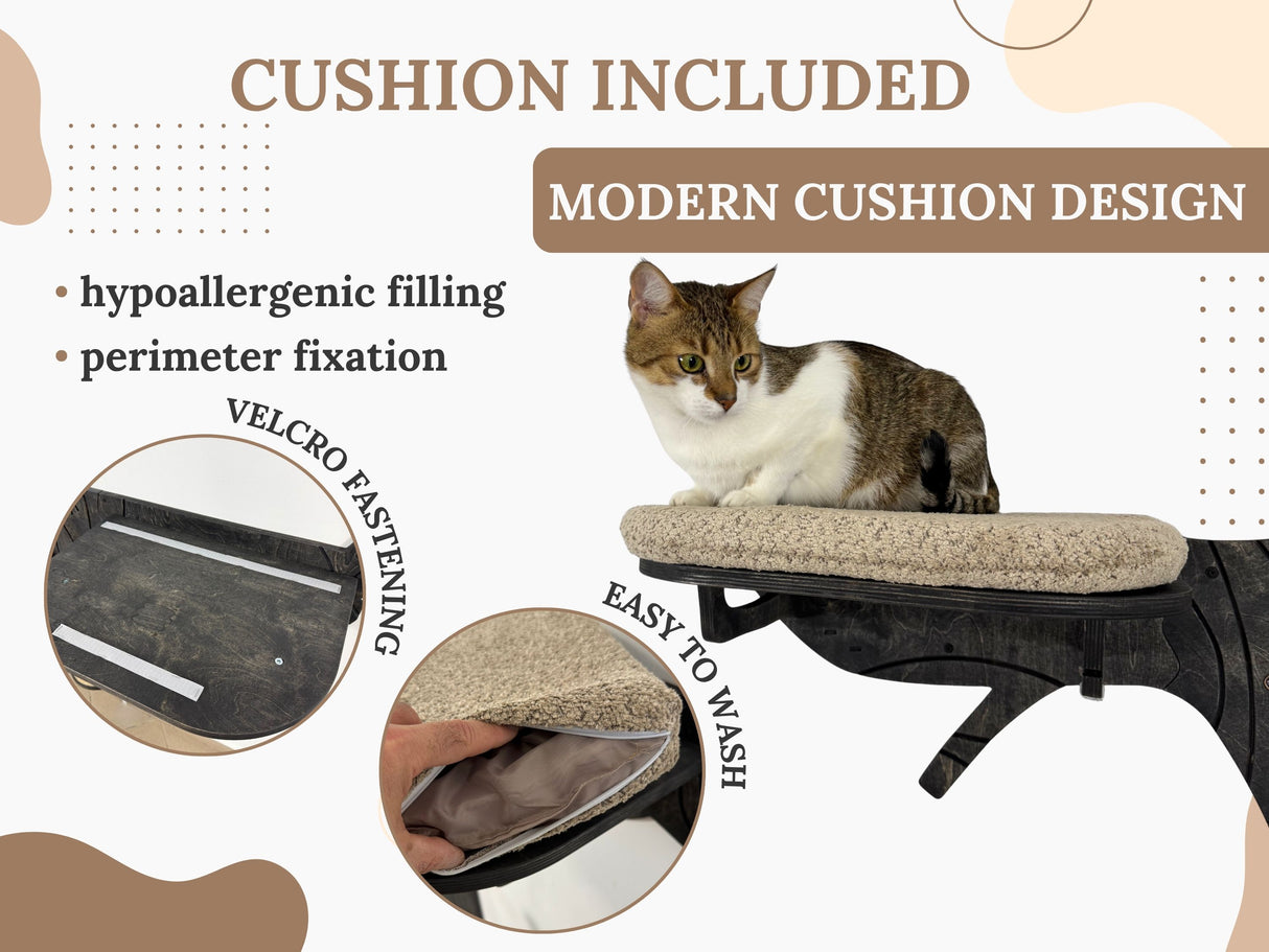 Cat sitting on a modern cushioned cat tree with features highlighted.