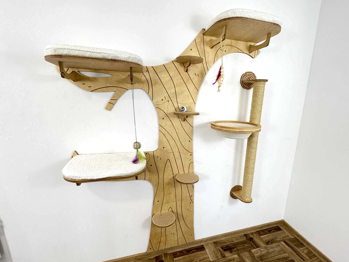 Wooden cat tree with multiple platforms and a scratching post on a white wall.
