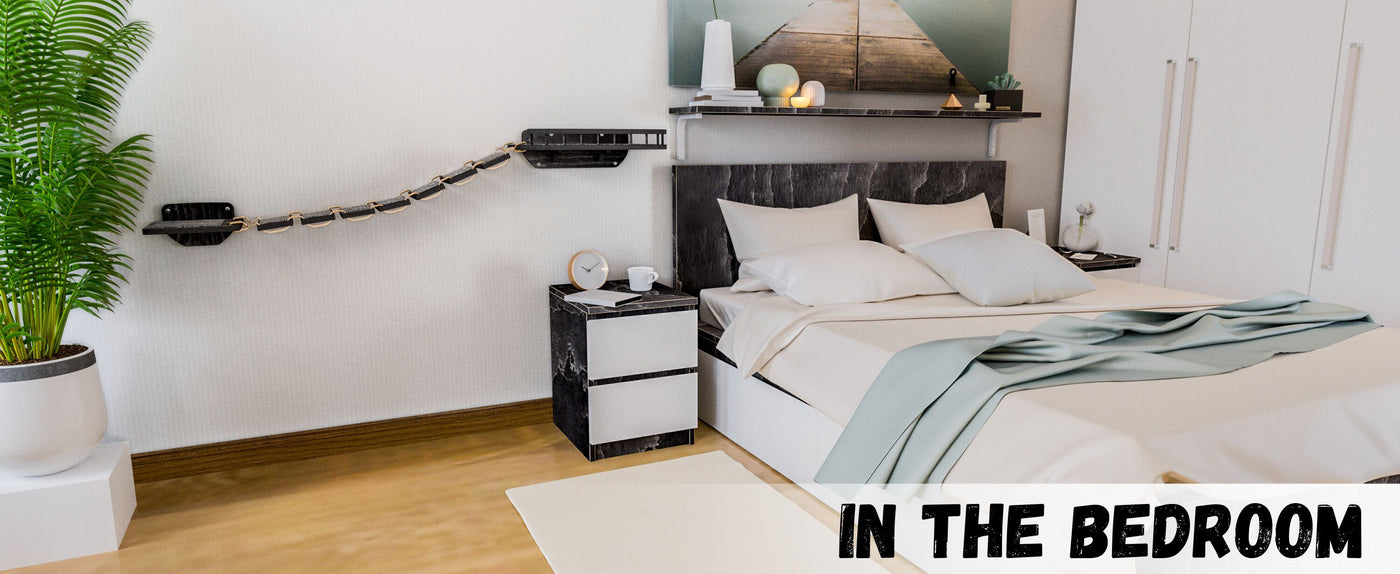 Modern bedroom with bed, nightstands, and decor elements.