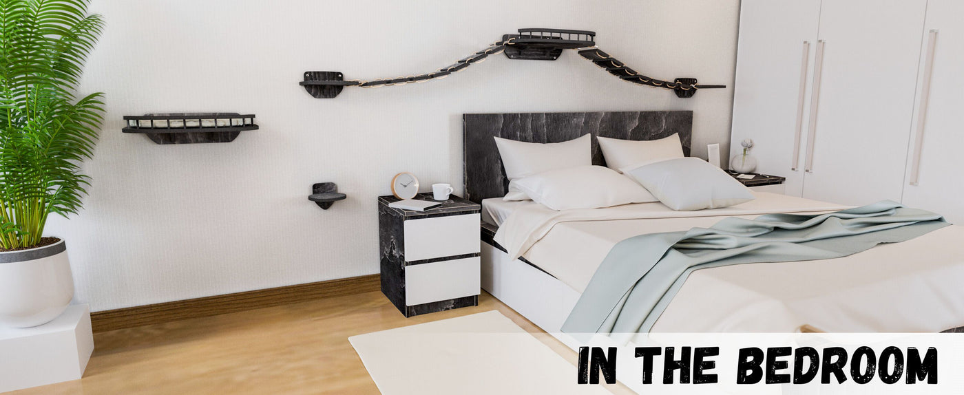 Modern bedroom with a bed, nightstands, and wall sconces.
