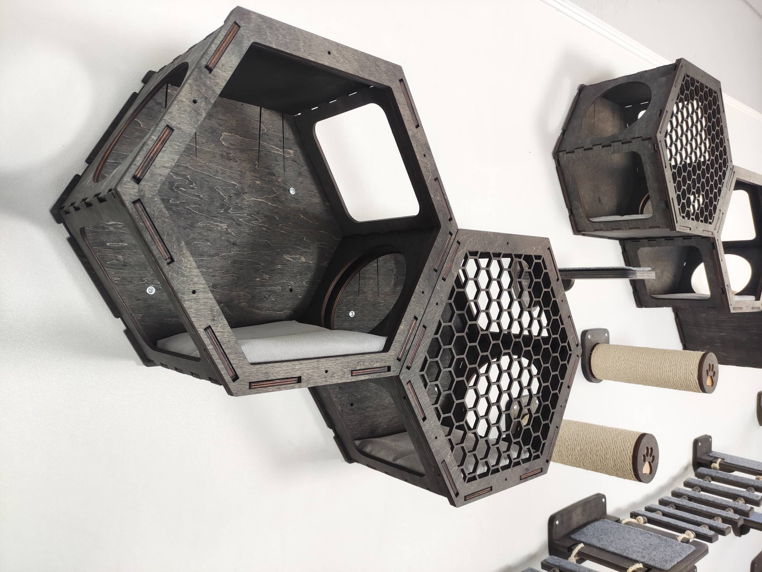 Wall-mounted cat shelves in the form of hexagons